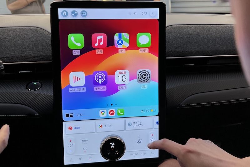 The center screen of Ford's Mach-e, showing multiple visual languages clashing with a mix of different colors, spacing, and icon sizes
